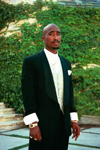 tupac in suit